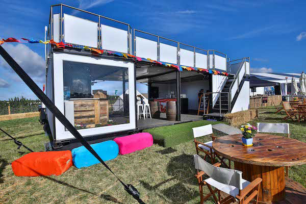 white box structure with outside seating